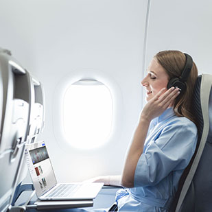 woman on board with headphones